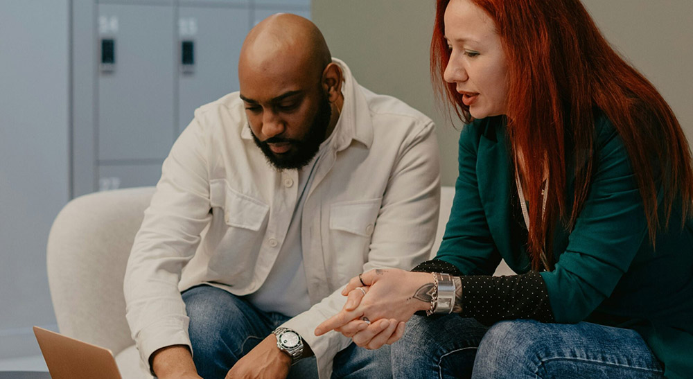 Man and woman looking down